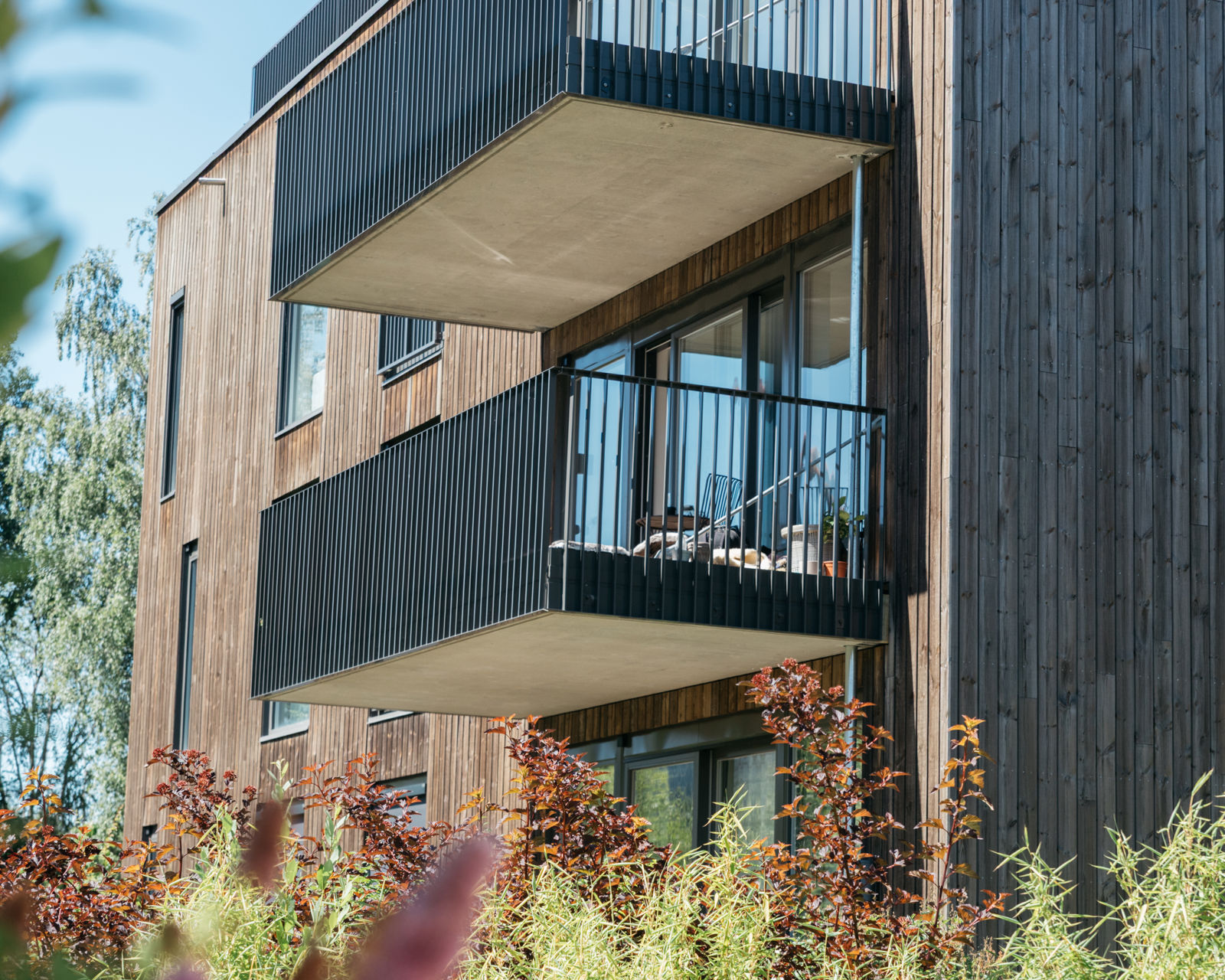 Balkong med grønt utsyn i hagebyen